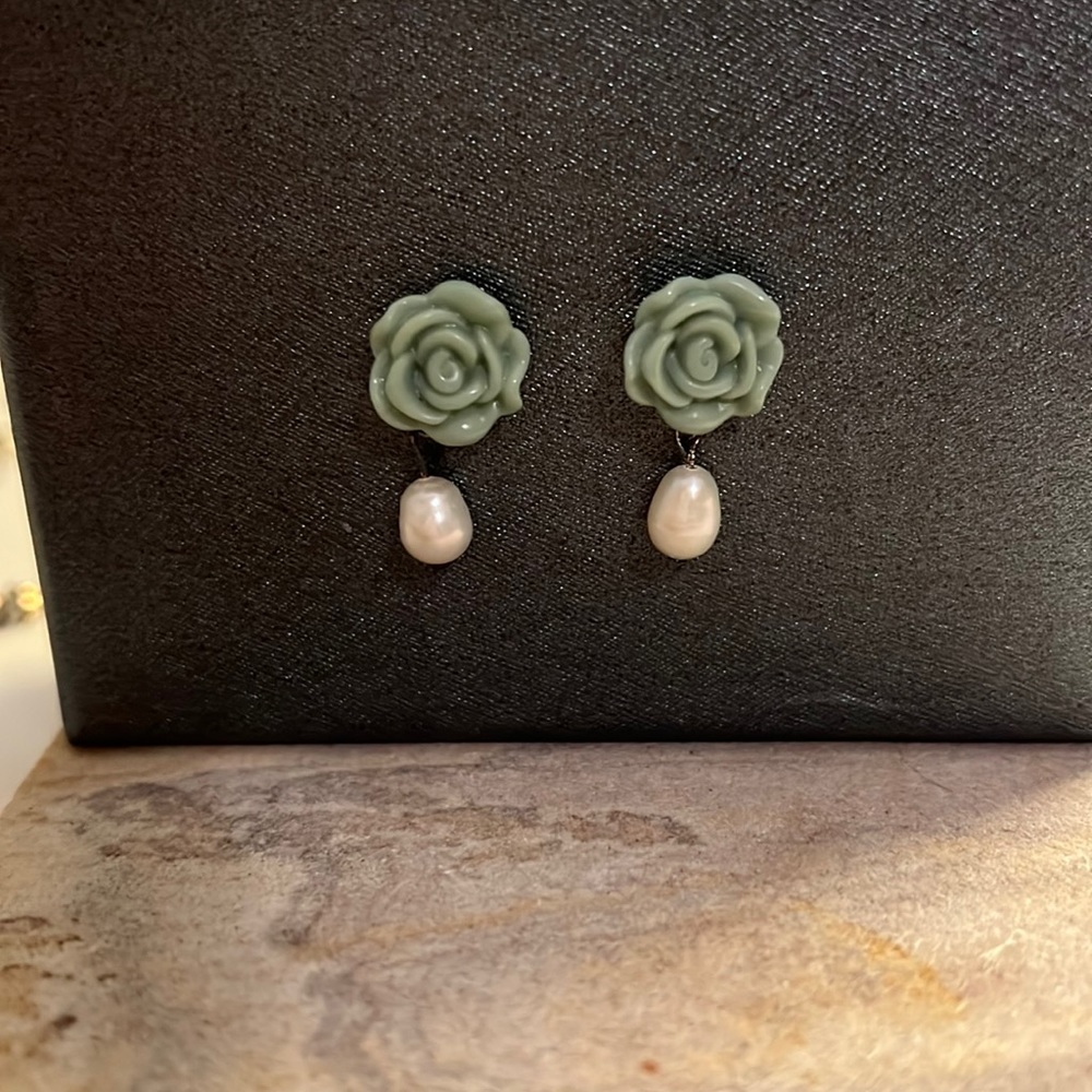 green flower and hanging pearl earrings